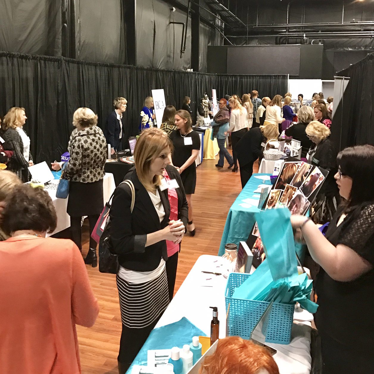 The Vendor area at the Women’s Symposium is buzzing with networking
