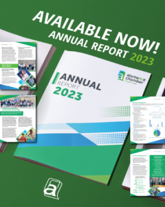 Green graphic with a photo of the annual report that says "AVAILABLE NOW / ANNUAL REPORT 2023" with photos of the pages flush to the sides.